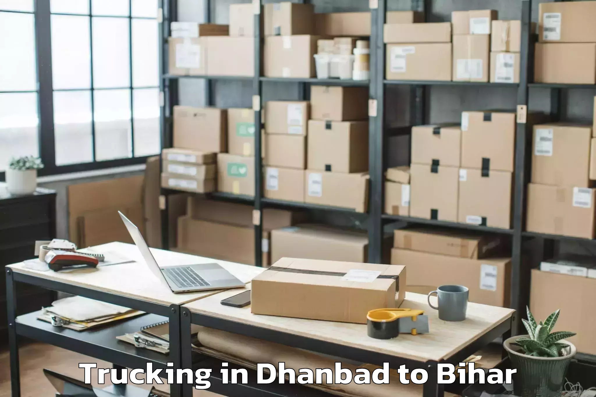 Get Dhanbad to Bankey Bazar Trucking